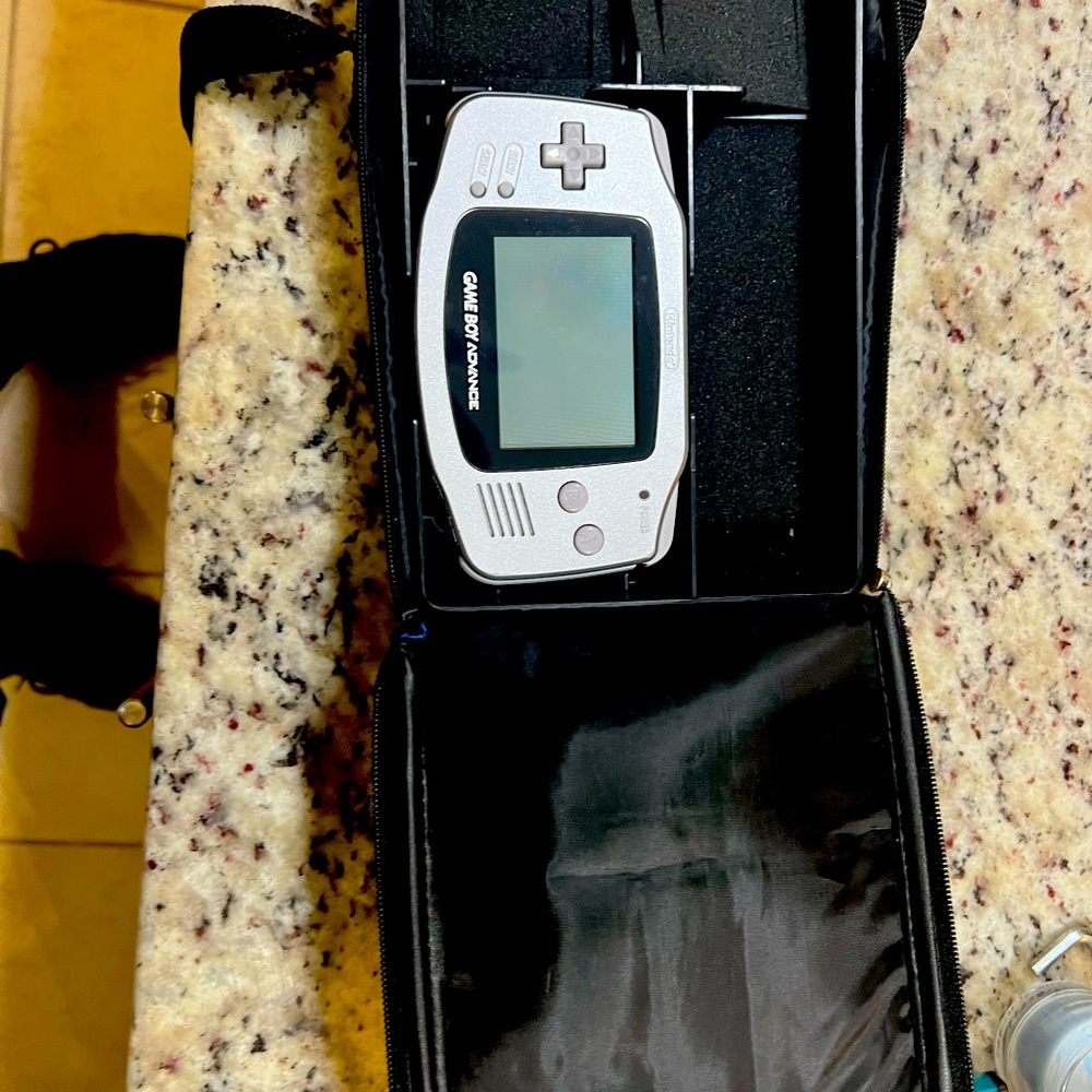 Game boy advance with carrying case. Full working condition